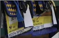  ?? JULIO CORTEZ — THE ASSOCIATED PRESS ?? Saddles for Kentucky Derby winner and Preakness entrant Medina Spirit, left, and Concert Tour are seen on a railing in the stables May 12at Pimlico Race Course in Baltimore.