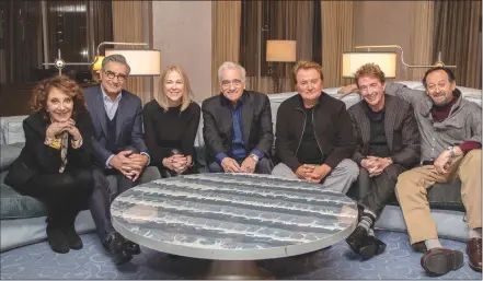  ?? Canadian Press photo ?? This undated image released by Netflix shows director Martin Scorsese, centre, with the cast of the Canadian sketch comedy show “SCTV.” From left are Andrea Martin, Eugene Levy, Catherine O'Hara, Dave Thomas, Martin Short and Joe Flaherty.