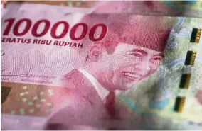  ??  ?? Drawing interest: The Indonesian rupiah is emerging as the most attractive currency in carry trades.