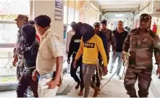  ?? AFP ?? Three Indian men appeared in court in Dumka after a woman was gang-raped. Police are hunting for four other suspects