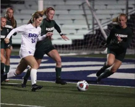  ?? RANDY MEYERS — FOR THE MORNING JOURNAL ?? Bay’s Kealy Sullivan moves the ball near the Madison goal during the first half of a regional semifinal on Oct. 30.