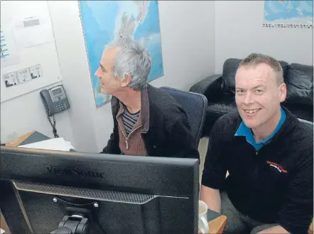  ?? Photo: KRIS DANDO ?? At work: Tony Sutorius, right, and editor Shane Loader in one of the editing suites in the bottom level of Sutorius’ Camborne home.