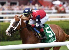  ?? PHOTO BY CHELSEA DURAND, PHOTO PROVIDED BY NYRA ?? Kid is Frosty takes the Statue of Liberty Division on Wednesday, July 31, 2019 at the Saratoga Race Course.