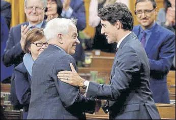  ?? REUTERS FILE ?? Canada's Prime Minister Justin Trudeau (right) with John Mccallum.