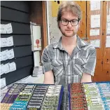  ?? GORD HOWARD TORSTAR ?? Jake Rigby says lottery ticket sales are steady at the store he works at on Ontario Street in St. Catharines, but they do pick up a bit after a big prize-winning ticket is sold there.