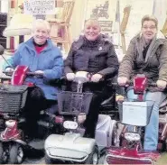  ??  ?? From left: Mo and Jaqui Collins and Deborah Keenan in Accrington Market at the launch of their Hospice 4 hospice fundraiser