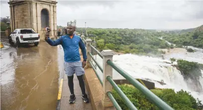  ?? Picture: Michel Bega ?? BURSTING AT SEAMS. Water rushes out of Hartbeespo­ort Dam sluice gates as it overflows on Sunday due to heavy rains in Gauteng, Free State and North West. The department of water and sanitation is urging people who live downstream to be cautious as the water levels continue to rise.