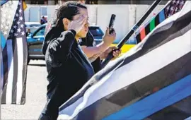  ?? ?? ANCELIN ARMIJO salutes during the funeral procession in Rancho Cucamonga. Sheriff Chad Bianco described Calhoun as “strong, kind, compassion­ate.”