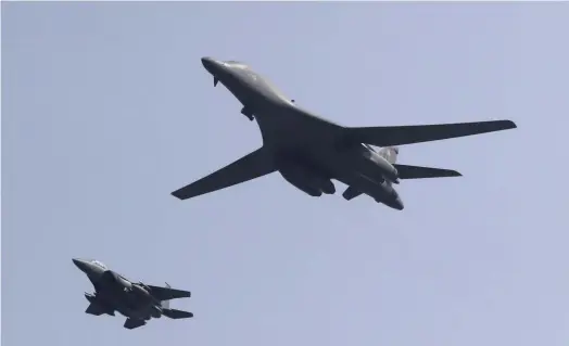  ??  ?? US B-1B Lancer bombers f lying over the Osan Air Bse, South Korea, last month