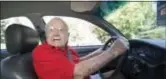  ?? DAMIAN DOVARGANES — THE ASSOCIATED PRESS FILE PHOTO ?? Jack Wyrad, 92, reverses his GM Buick in Los Angeles. Wyard, who got a perfect score on his written test for his license two years ago, says he believes older people should make their own decisions on when to quit driving.