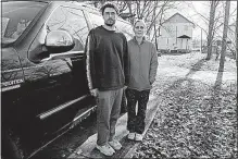  ?? [EMMA HOWELLS/DISPATCH] ?? Travis Sherwood and his fiancee, Robin Shover, have been spending their nights sleeping in their Ford Expedition truck since they were evicted from the home in the background.