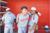  ?? MARLA BROSE/JOURNAL ?? Bernalillo’s Daniel Gutierrez, center, celebrates with teammate Isaiah Chavez, right, after scoring against Robertson.