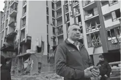  ?? Tribune News Service/getty Images ?? Kyiv, Ukraine, Mayor Vitali Klitschko stands in front of a damaged building following Russian strikes in Kyiv on April 29 amid Russia’s invasion of Ukraine.