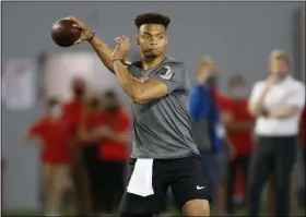  ?? PAUL VERNON - THE ASSOCIATED PRESS ?? FILE - Ohio State quarterbac­k Justin Fields throws during an NFL Pro Day at Ohio State University in Columbus, Ohio, in this Tuesday, March 30, 2021, file photo.