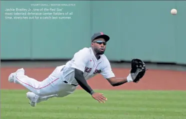  ?? STUART CAHILL / BOSTON HERALD FILE ?? Jackie Bradley Jr., one of the Red Sox’ most talented defensive center fielders of all time, stretches out for a catch last summer.
