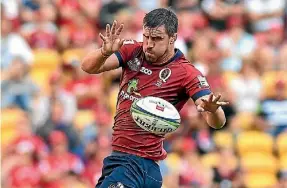  ??  ?? Former Wallabies lock Kane Douglas wins clean lineout ball for the Reds in Brisbane yesterday.