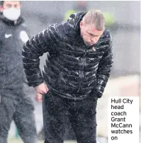  ??  ?? Hull City head coach Grant Mccann watches on