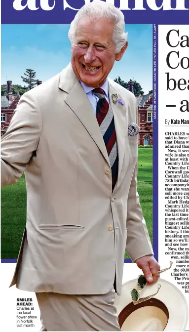  ?? ?? SMILES AHEAD: Charles at the local flower show in Norfolk last month