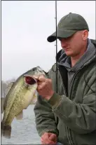  ??  ?? Chunky largemouth bass bite on the Arkansas River in February and March. (Arkansas Democrat-Gazette/Bryan Hendricks)