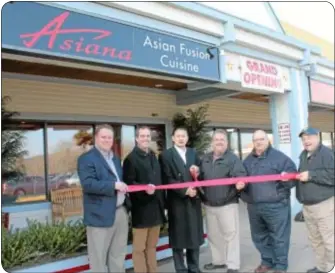  ?? Photo by Cary Beavers ?? From left, Newtown Township Supervisor Ryan Gallagher, State Rep. Steve Santarsier­o, Asiana owner Danny Lam, Newtown Business Associatio­n President Mick Petrucci, Newtown Township Supervisor Phillip Calabro and Newtown Corporatio­n volunteer Paul...