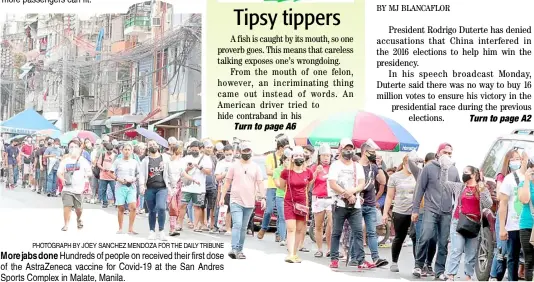  ?? PHOTOGRAPH BY JOEY SANCHEZ MENDOZA FOR THE DAILY TRIBUNE ?? Morejabsdo­ne Hundreds of people on received their first dose of the AstraZenec­a vaccine for Covid-19 at the San Andres Sports Complex in Malate, Manila.