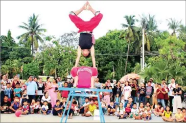  ?? SUPPLIED ?? Circus members perform stunts in front of an audience. The group received the TripAdviso­r Certificat­e of Excellence 2018..