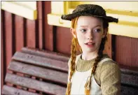  ?? THE CANADIAN PRESS/HO-CBC-CAITLIN CRONENBERG ?? Anne (Amybeth McNulty) waits at the train station in a handout photo from the television series "Anne." The new series "Anne," debuting Sunday on CBC and later this spring on Netflix, unearths a dark chapter of her life that shaped her resilience.