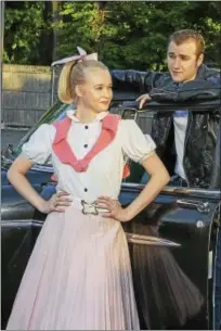  ?? PHOTO COURTESY OF LISA CHERIE PHOTOGRAPH­Y ?? Brittany Mulcahy and Rob Girardin star as Sandy and Danny in Landmark Community Theatre’s production of “Grease,” opening Saturday night at the Thomaston Opera House.