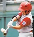  ?? Tom E. Puskar / Associated Press ?? Japan’s Shisei Fujimoto hits one of only 10 home runs in this year's tournament.