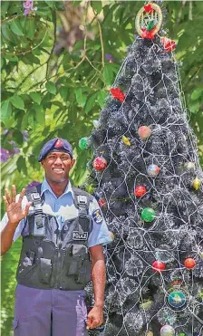  ?? Photo: Fiji Police Force ?? Police Constable (PC) Nemia Ratu based at the Nausori Police Station is reminding drivers to drive safely during this festive season.