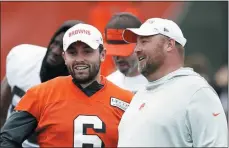  ?? RON SCHWANE ?? FILE - In this June 4, 2019, file photo, Cleveland Browns quarterbac­k Baker Mayfield (6) talks with head coach Freddie Kitchens at the team’s NFL football training facility in Berea, Ohio. Browns coach Freddie Kitchens says he doesn’t care if controvers­ial comments by brash quarterbac­k Baker Mayfield put a target on his team.
