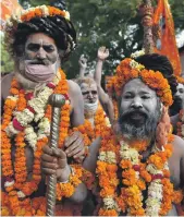  ?? EPA ?? The sadhus, or holy men, who lead the shahi snan bathing ritual for the Kumbh Mela