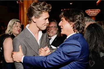  ?? Frazer Harrison / Getty Images ?? Austin Butler, left, and Tom Cruise attend the 95th annual Oscars Nominees Luncheon at The Beverly Hilton on Monday in Beverly Hills, Calif.