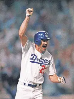  ?? RUSTY KENNEDY, AP ?? The Dodgers’ Kirk Gibson celebrates hitting a game-winning home run in Game 1 of the 1988 World Series, the last time Los Angeles made the Fall Classic.