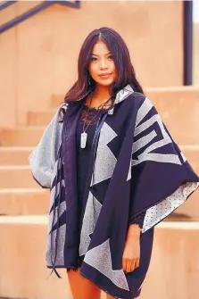  ??  ?? Diné (Navajo) designer Penny Singer uses bold designs in her garments.