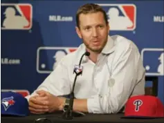  ?? JOHN RAOUX — THE ASSOCIATED PRESS FILE ?? In this file photo, two-time Cy Young Award winner Roy Halladay answers questions after announcing his retirement after 16 seasons in the major leagues with Toronto and Philadelph­ia at the Major League Baseball winter meetings in Lake Buena Vista, Fla....