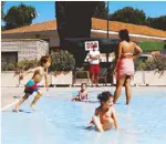  ?? REUTERS ?? Children enjoy the outdoors in Madrid on Tuesday.