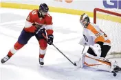  ?? ?? Anthony Duclair has his shot turned away by Flyers goalie Martin Jones. Duclair later set up the Panthers’ first goal.