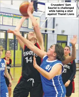  ??  ?? Crusaders’ Sam Sauriol is challenged while taking a shot against Thanet Lions