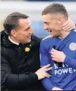  ??  ?? TWICE AS GOOD: Rodgers (left) says Vardy is worth two players
