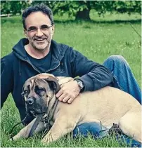  ??  ?? Actor and surgeon: Noel Fitzpatric­k with one of his patients, Dupe, a South African mastiff