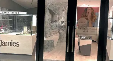  ??  ?? The damage at Jamies Jewellers in Queenstown following a burglary where a significan­t number of expensive men’s watches were stolen.