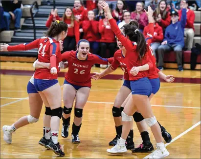  ?? Photo by Jerry Silberman / risportsph­oto.com ?? Not much was expected of the Mount St. Charles girls volleyball team after the graduation of a number of starters, but the Mounties reached the state semifinals behind the play of Ally Melnychuk (26), Liz Jarrier (24) and Issa Miller (27).
