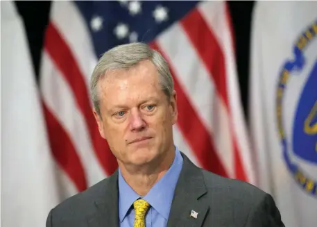  ?? PooL pHoTo ?? REMAINING CONCERNS: Gov. Charlie Baker announces new restrictio­ns Friday, including quarantine for visitors from virus hot spots.