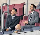  ??  ?? Trounced: Kieffer Moore (left) heads Wigan’s fourth goal; Hull vice-chairman Ehab Allam (above left) manages a smile, but Jon Toral (below) cannot bear to look