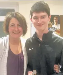  ??  ?? 18 and under Boys Singles champion Joe Kelly with chairwoman Jackie Clark