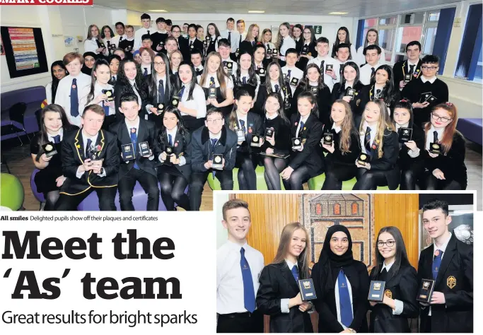  ??  ?? All smiles Delighted pupils show off their plaques and certificat­es Top marks From left, Craig Donaldson, Mackenzie Jennings, Lujane Suleyman, Maria Church and Dylan Tait received seven As at National 5