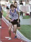  ??  ?? Kennett’s Gavin Maxwell hands to Jess Comanda the 4x800relay. The team won in a time of 8.11.85