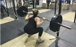  ?? MEAGHAN SAELENS ?? The practice of weightlift­ing has more in common with the art of meditation than first meets the eye, writes Chaunie Brusie.