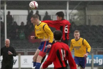  ??  ?? Seán Keane-Carroll of Curracloe United and Ethan Vickers of Gorey Rangers battle for the ball.